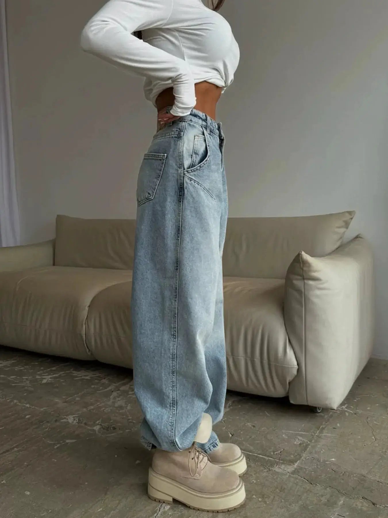 Wide Leg Jeans by Belle Bijouix; light-wash denim with pockets.