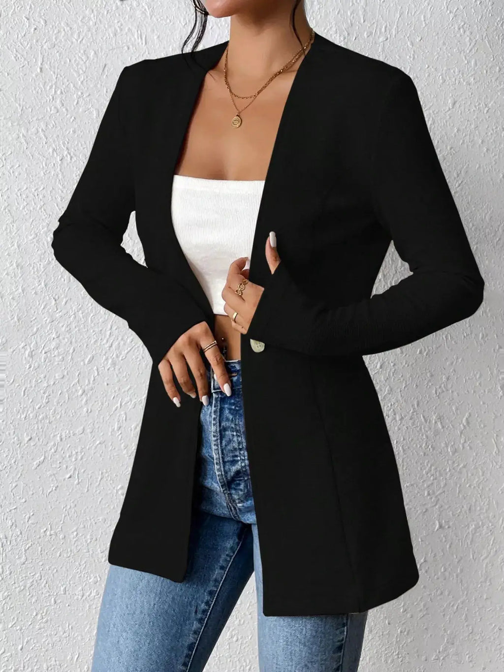 Single-Button Black Long-Sleeve Blazer worn over a white top and blue jeans