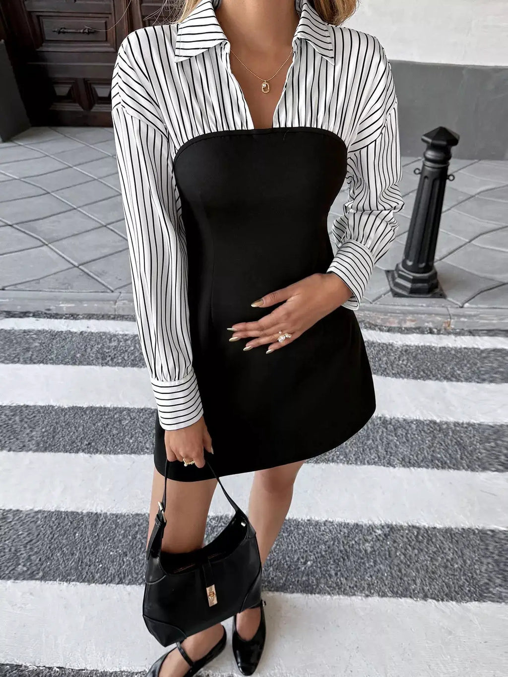 Striped shirt-panel bodycon mini dress; white and black long-sleeve striped top with collar over a black fitted mini.