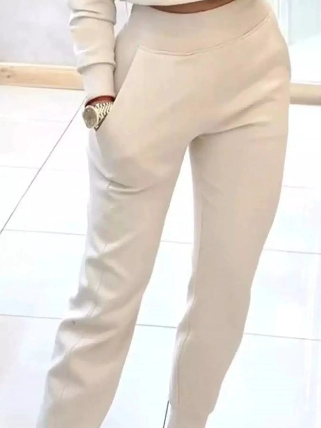 Casual Chic Cropped Sweatshirt and Jogger Set by Belle Bijouix; beige activewear with pocketed joggers