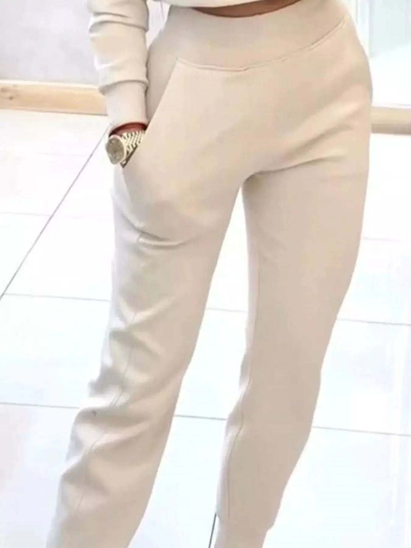 Casual Chic Cropped Sweatshirt and Jogger Set by Belle Bijouix; beige activewear with pocketed joggers