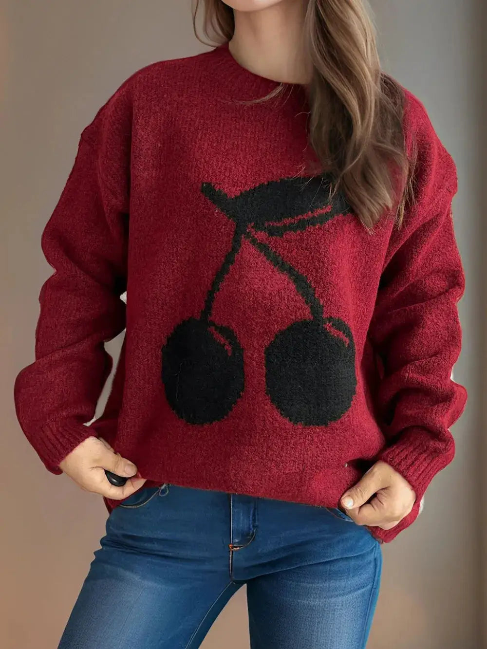 Cherry red round-neck long-sleeve sweater with a black cherry graphic