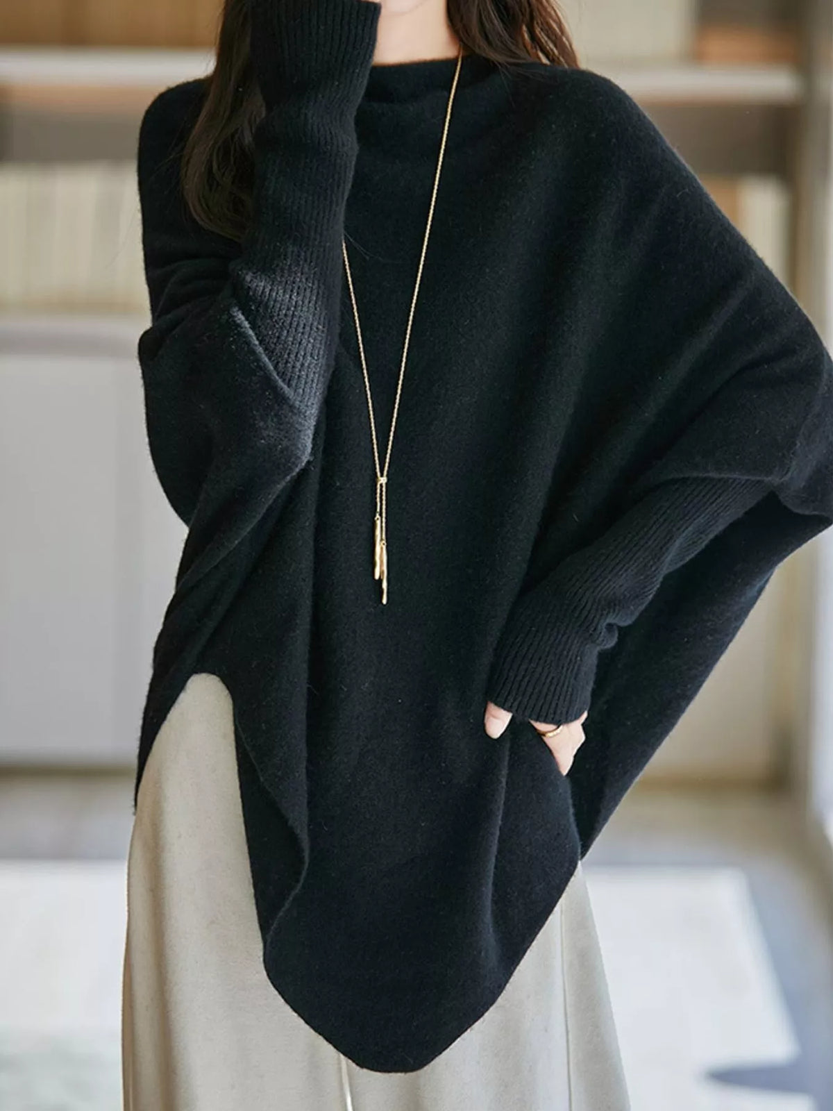 Oversized Asymmetric Wool Batwing Sweater in Black by Belle Bijouix – view 19 of 24