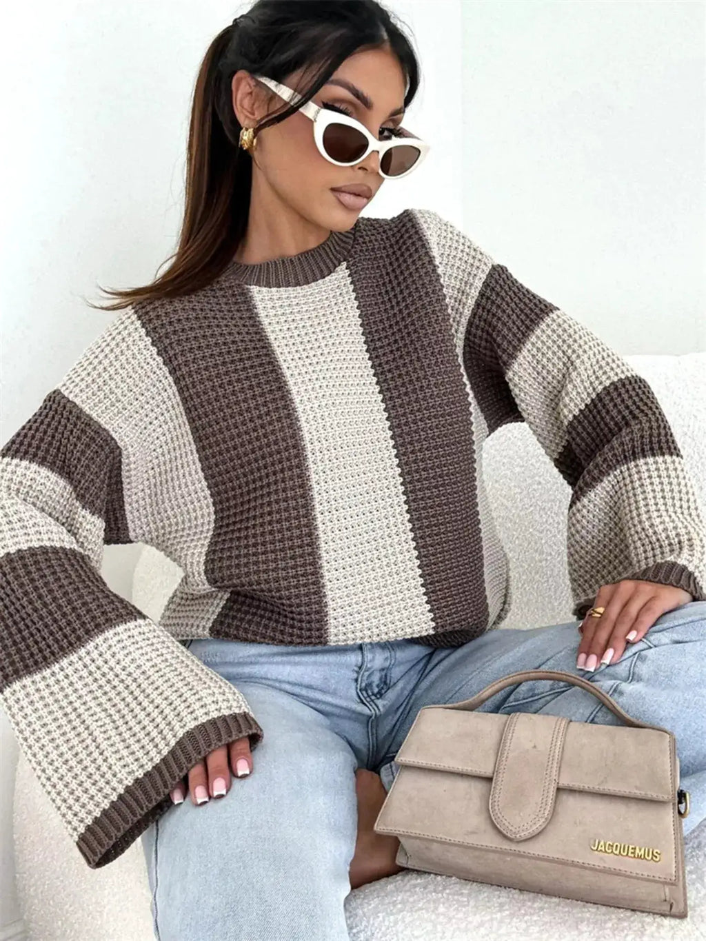 Color Block Long Sleeve Sweater; oversized knit in brown and cream, paired with beige Jacquemus handbag.