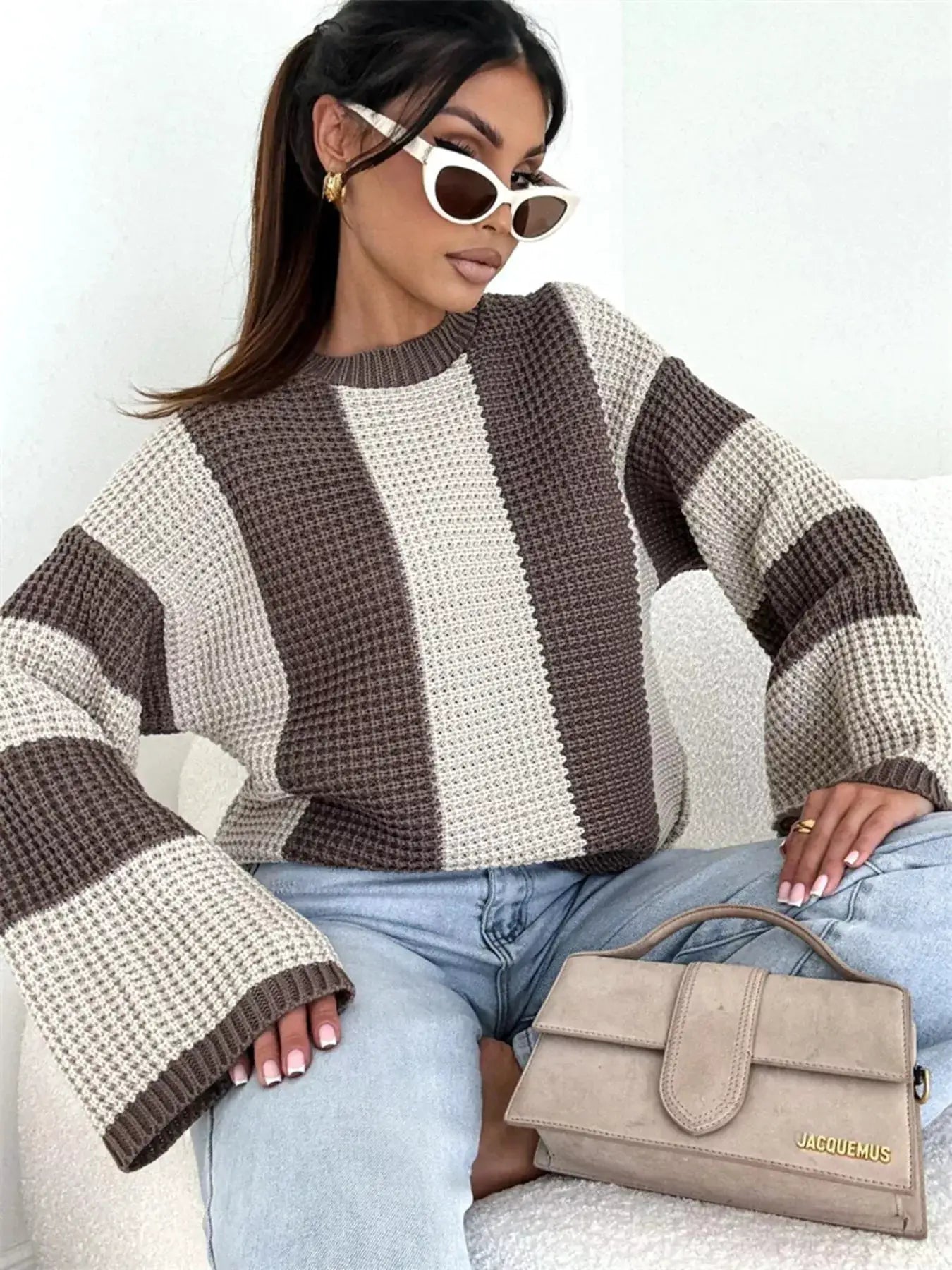 Color Block Long Sleeve Sweater; oversized knit in brown and cream, paired with beige Jacquemus handbag.