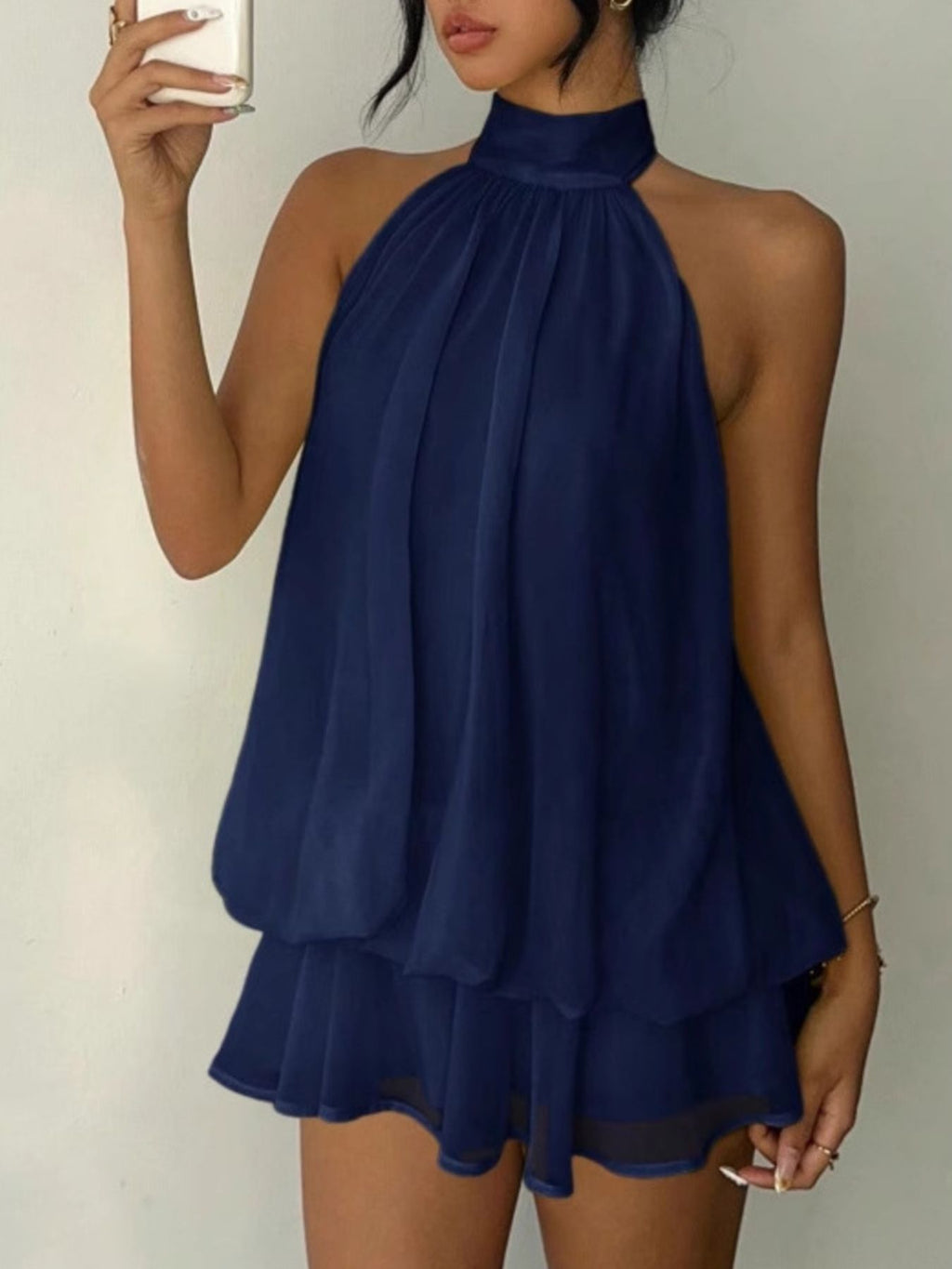 Halter neck layered mini dress in navy blue with tiered, tied detailing