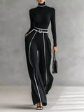 Turtleneck Long Sleeve Top and Contrast Pants Set by Trendsi in black with white piping and belted waist.