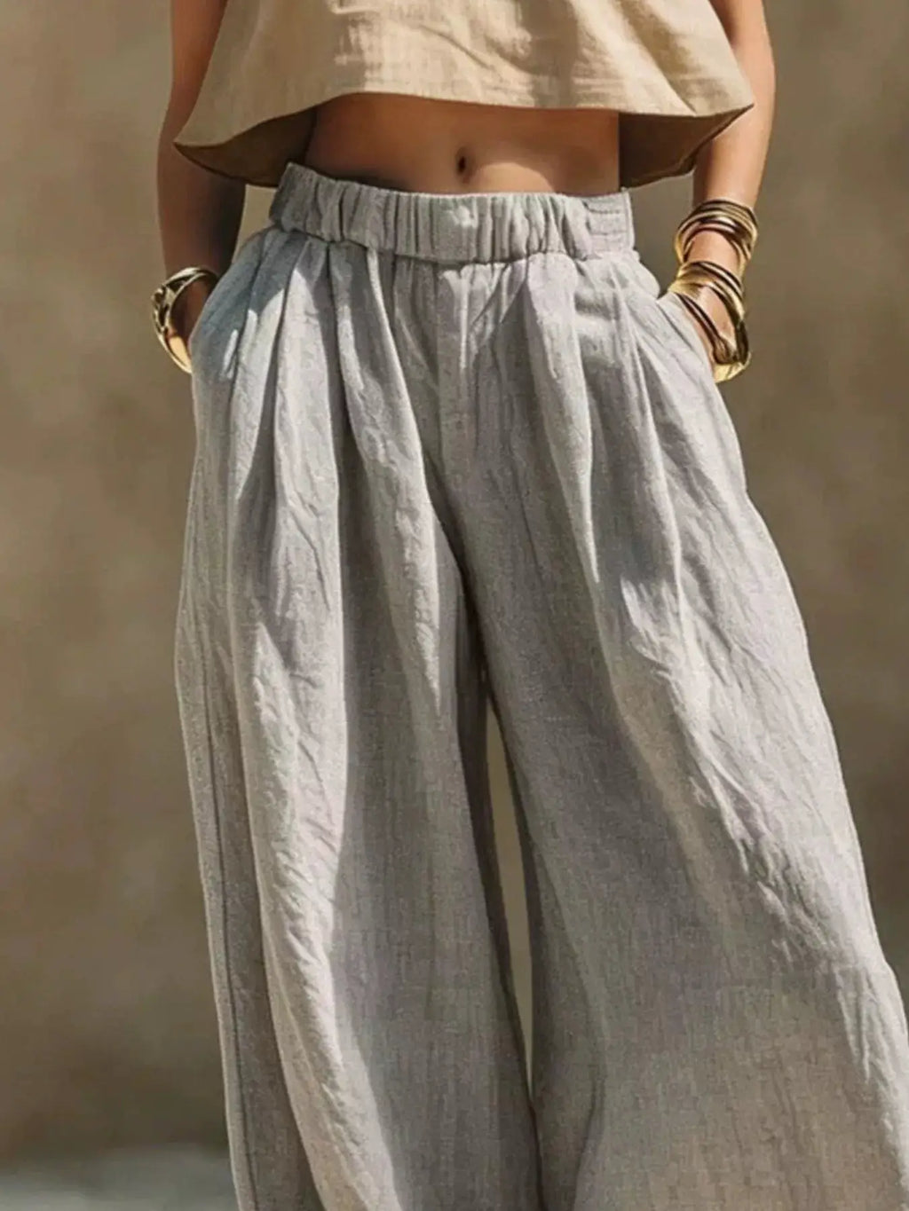 Plus-size gray elastic-waistband wide-leg pants by Trendsi