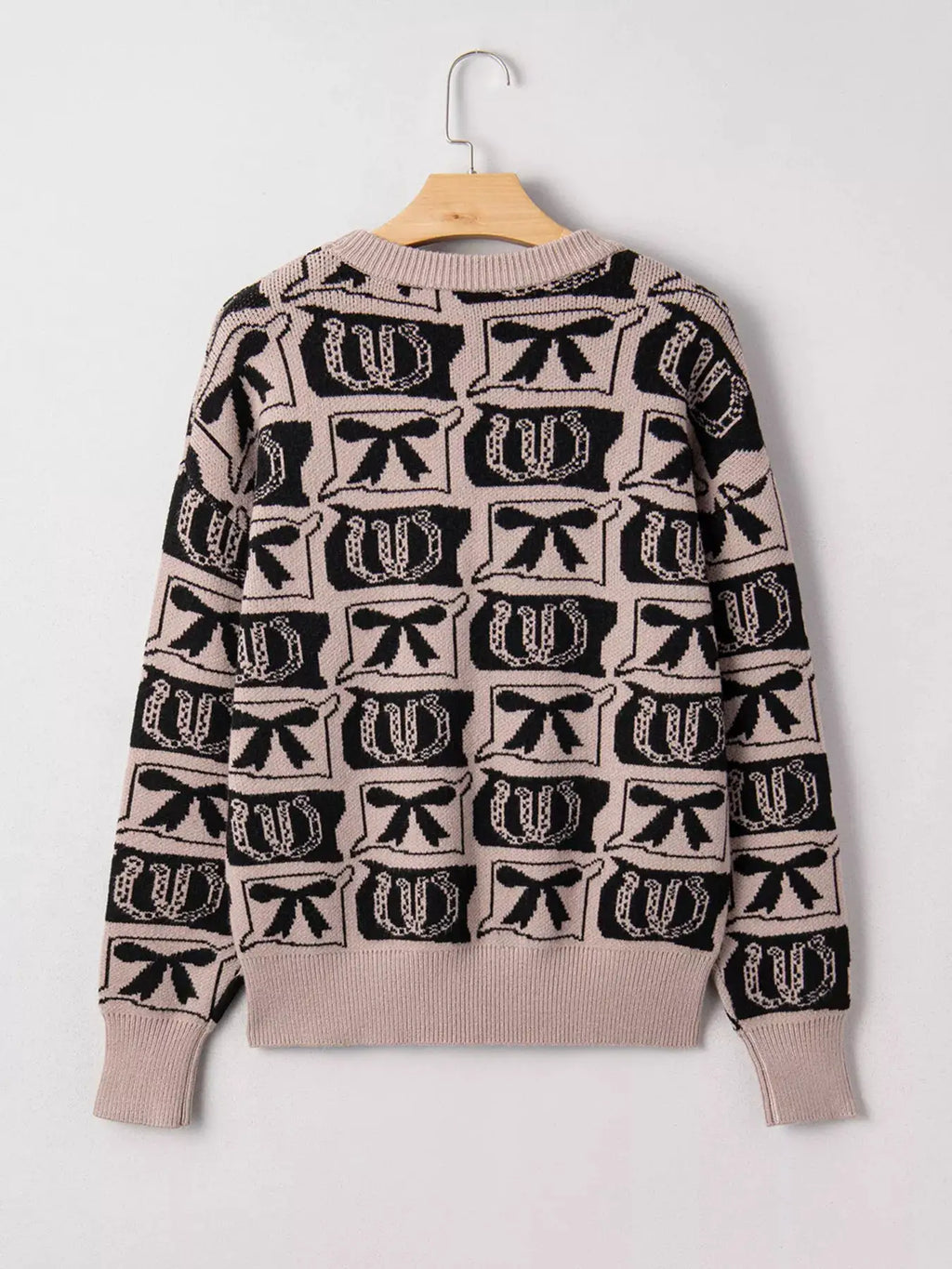 Bows & Horseshoes pattern round-neck sweater, pink with black motifs by Belle Bijouix