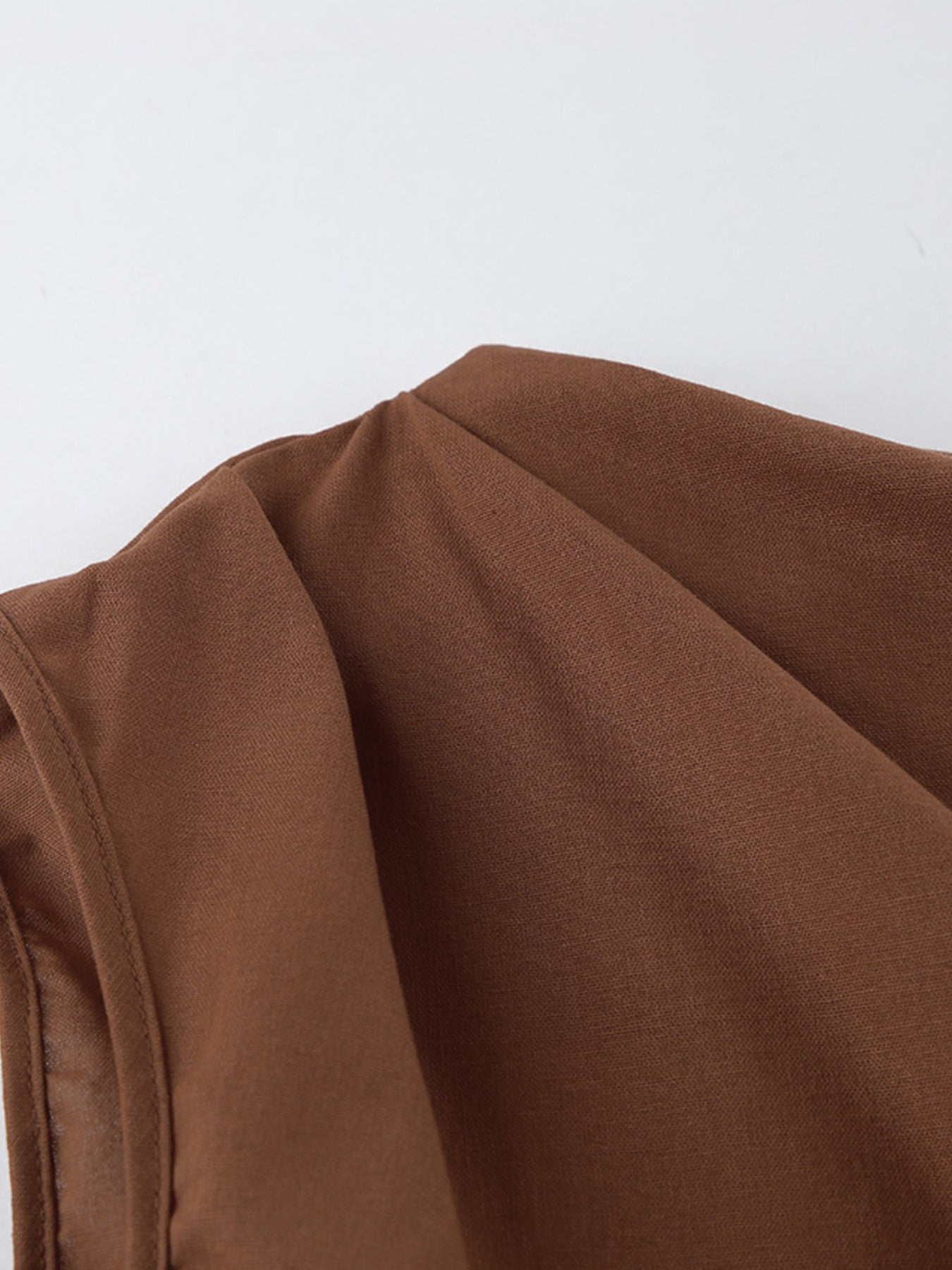 One-Shoulder Top and Shorts Set in brown fabric with ruched, asymmetrical styling