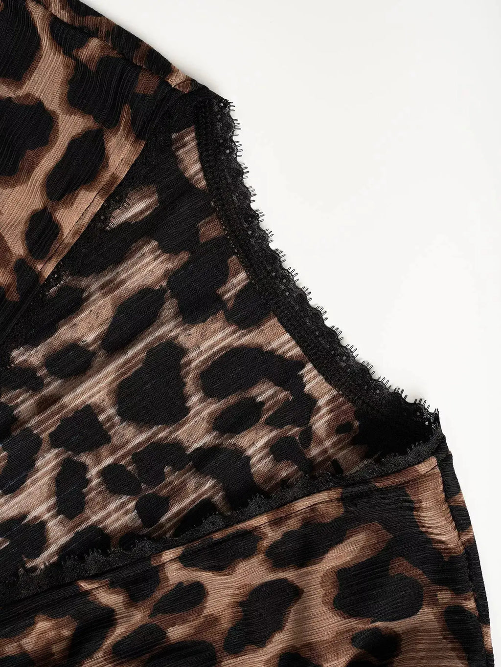 Leopard print Button-Down Top with black lace trim along edge