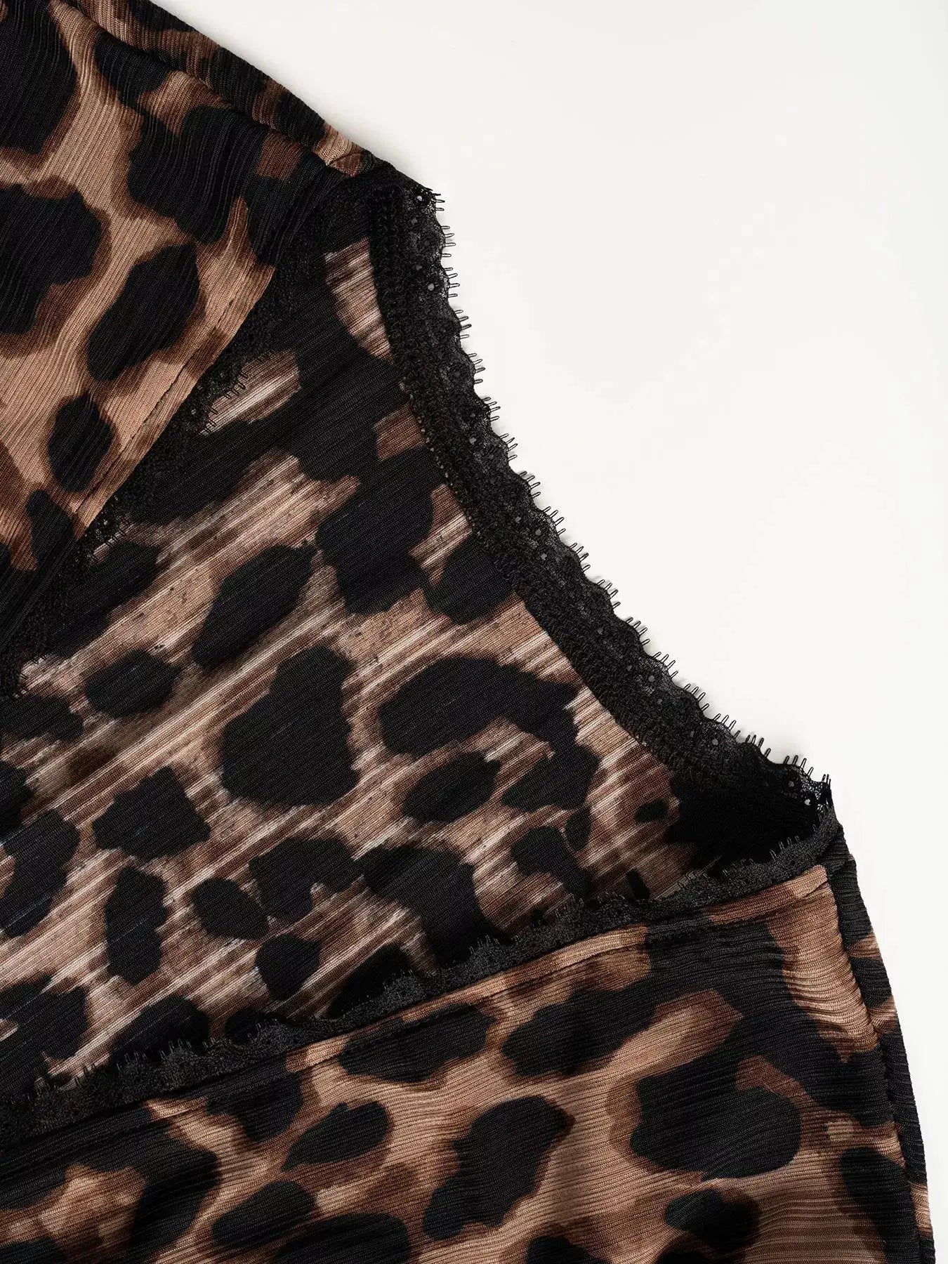 Leopard print Button-Down Top with black lace trim along edge
