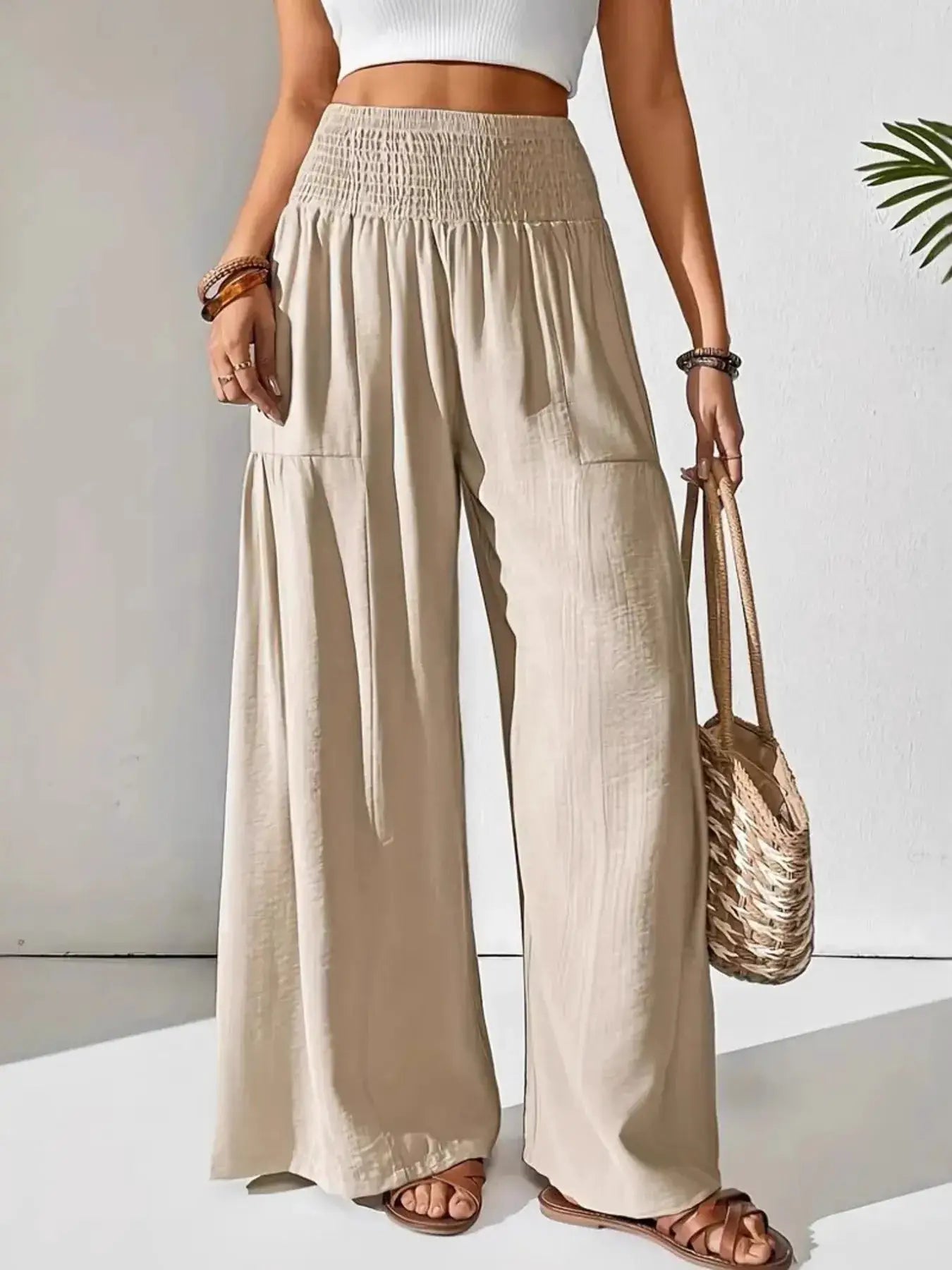 Smocked Waist Wide Leg Pants by Belle Bijouix, beige pocketed bottoms with smocked waistband