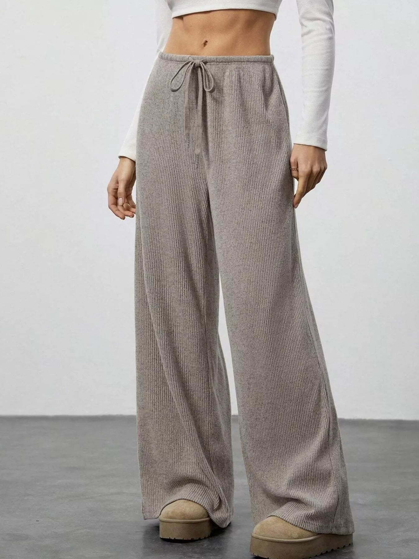 Relaxed Fit Drawstring Pants in beige ribbed knit with pockets