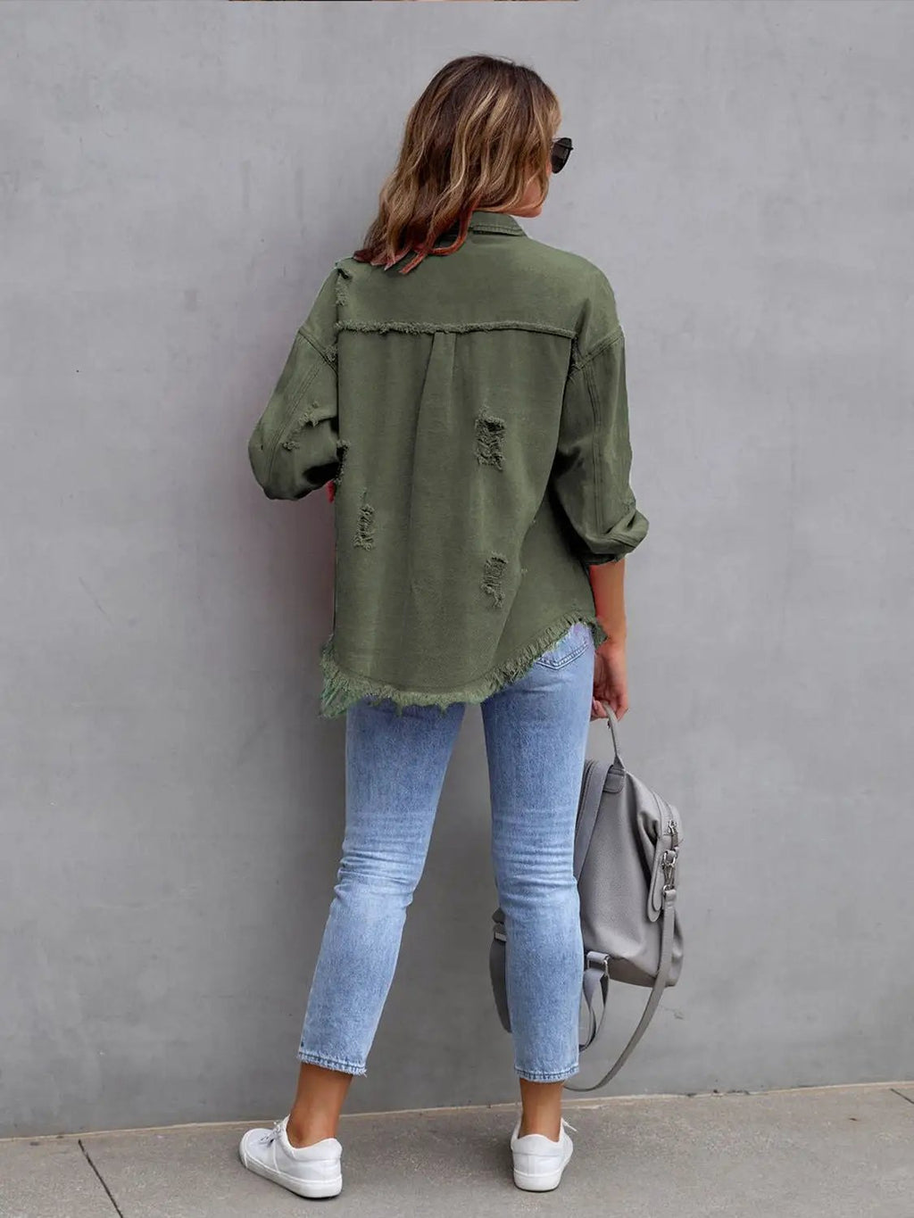 Distressed drop-shoulder denim jacket in olive green; casual top by Belle Bijouix.