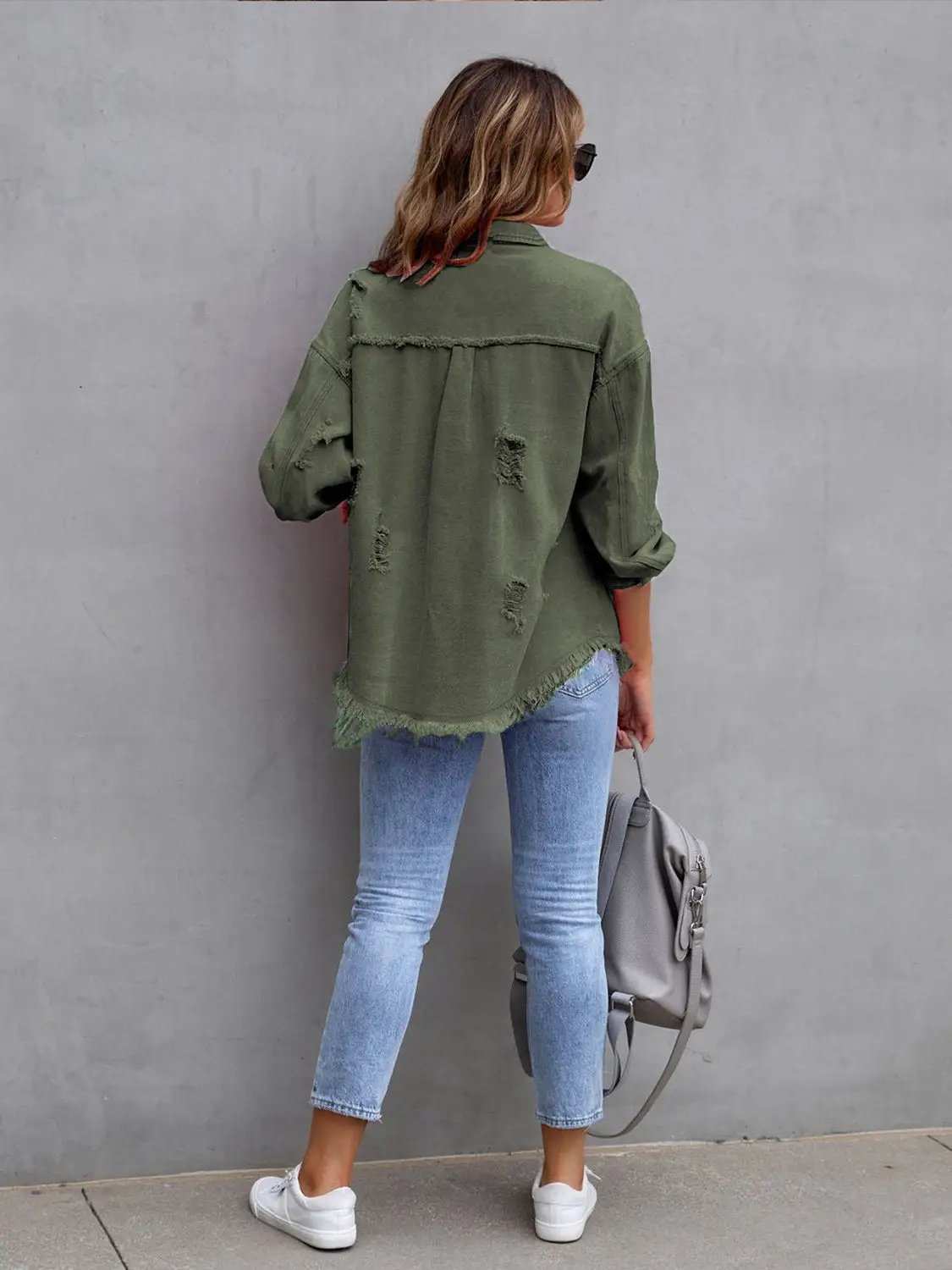 Distressed drop-shoulder denim jacket in olive green; casual top by Belle Bijouix.