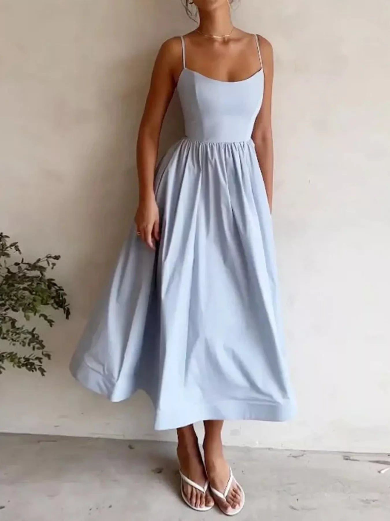 Adjustable Strap Scoop Neck Midi Dress in light blue by Trendsi, with a flowing skirt