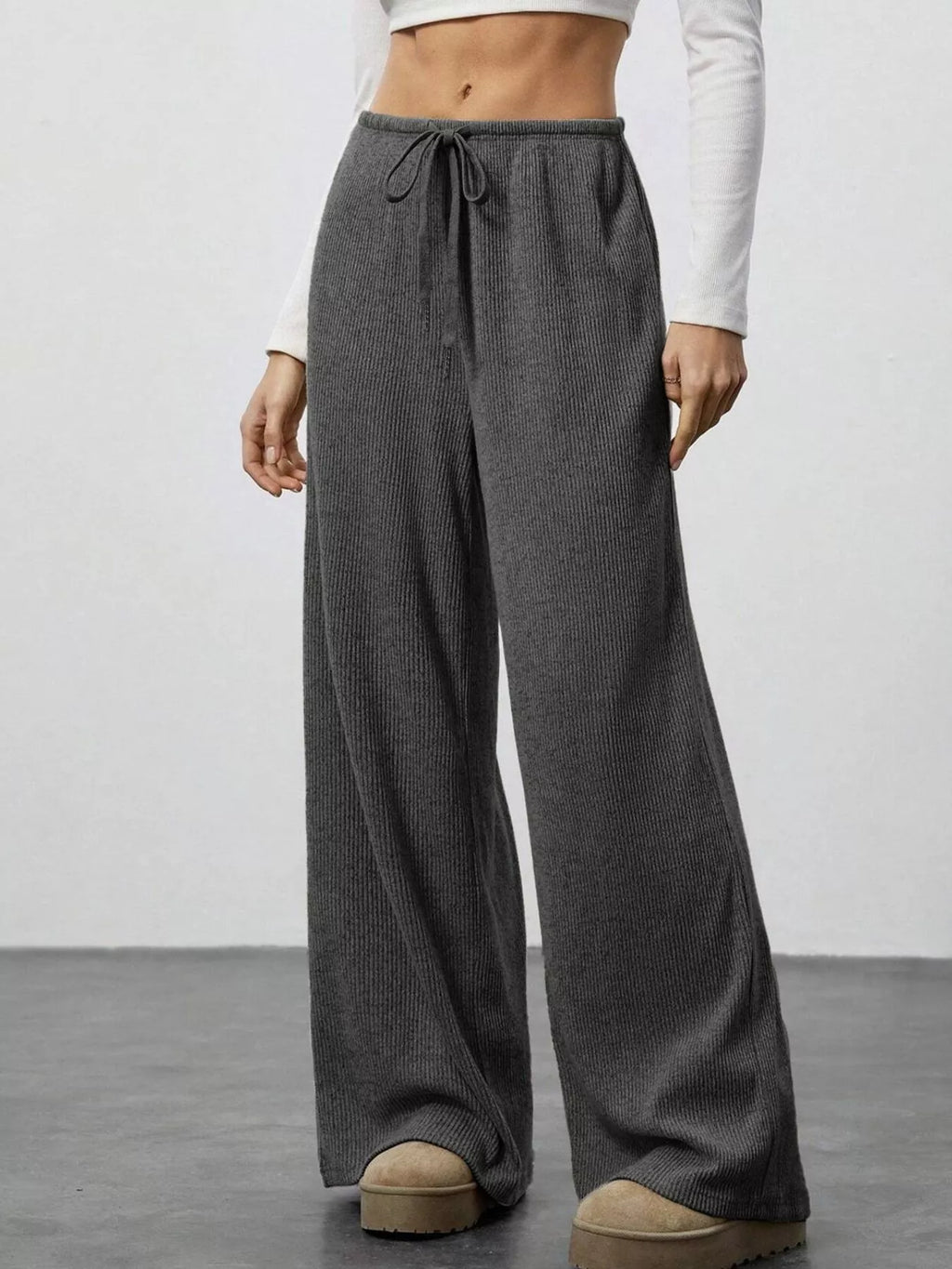 Relaxed Fit Drawstring Pants in gray corduroy with pockets; wide-leg joggers.