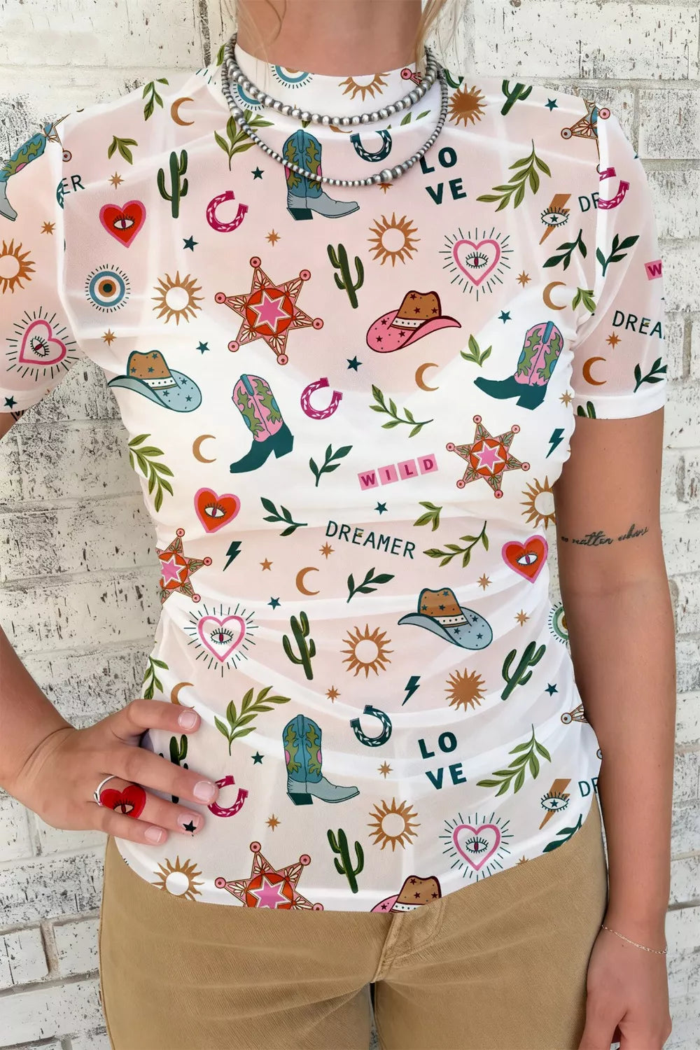 LOVE WILD DREAMER Western Print Sheer Mesh Top, white mesh with colorful cowboy hats, boots, cacti and hearts