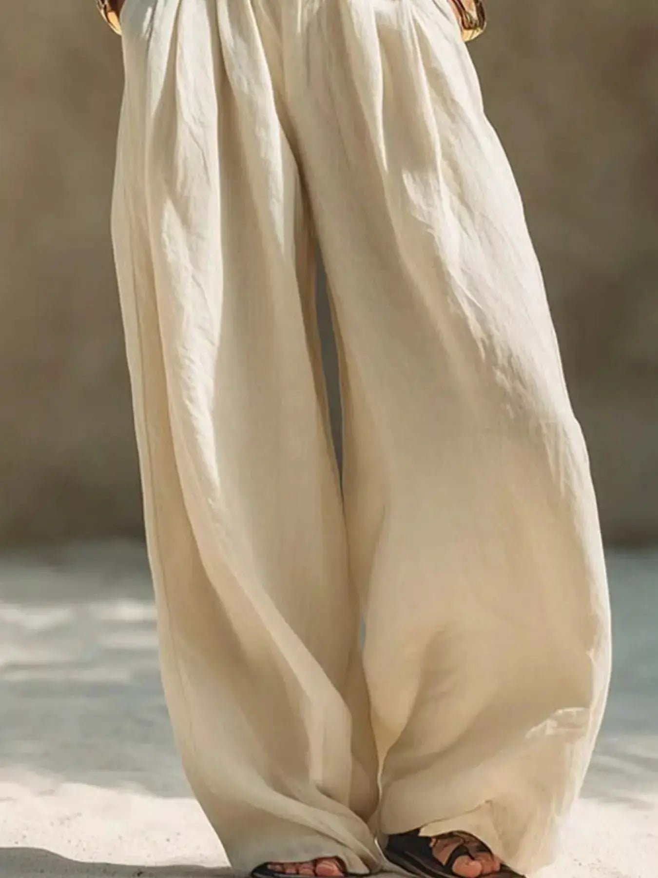 Full Size Elastic Waistband Wide-Leg Pants Plus Size by Trendsi in beige linen-look fabric.