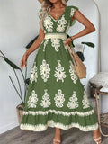 Printed V-Neck Ruffled Cap Sleeve Dress by Belle Bijouix, green with white ornate motif and smocked waist