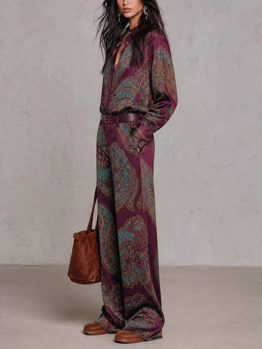 Side view of burgundy paisley shirt and wide-leg pants set
