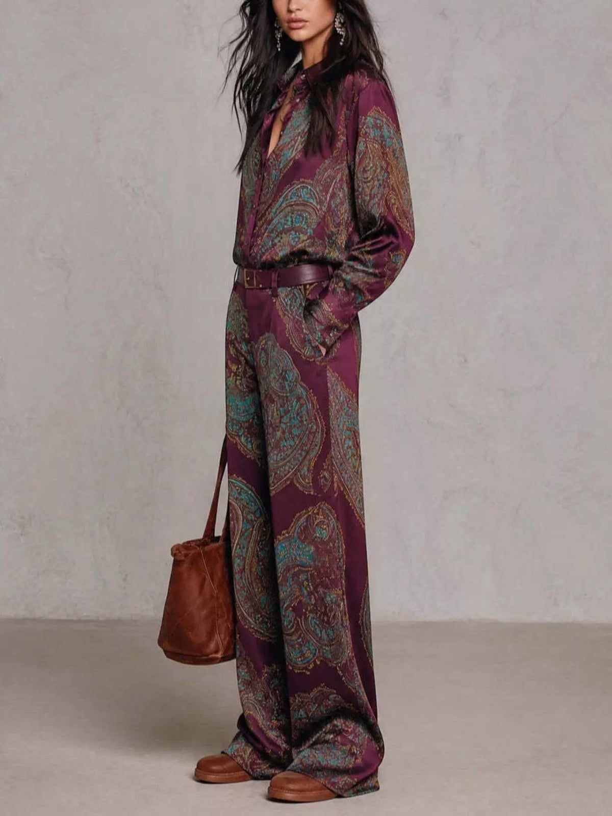 Side view of burgundy paisley shirt and wide-leg pants set