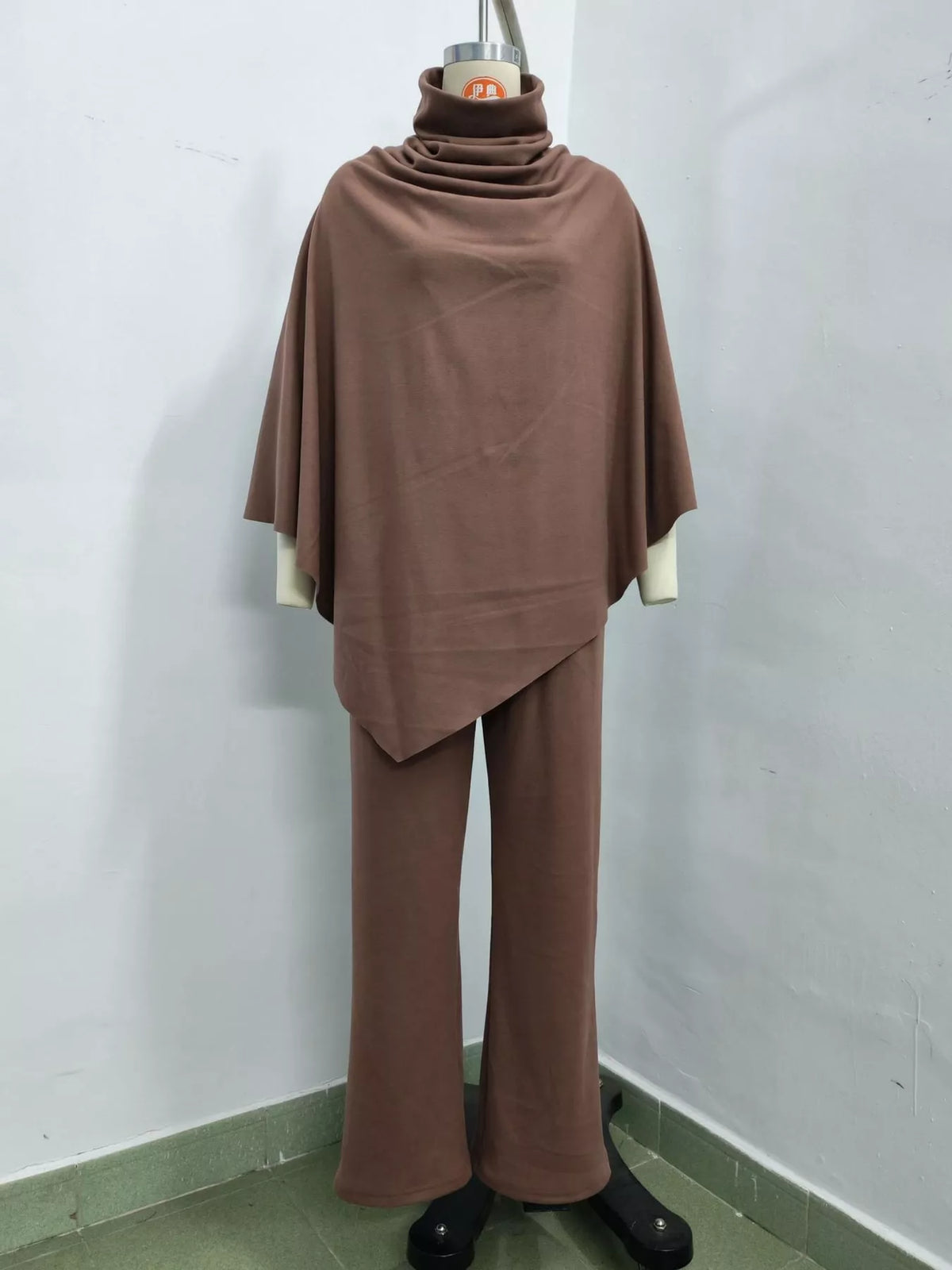 Turtleneck Poncho & Wide-Leg Pants Set in Light Coffee by Belle Bijouix – view 8 of 24