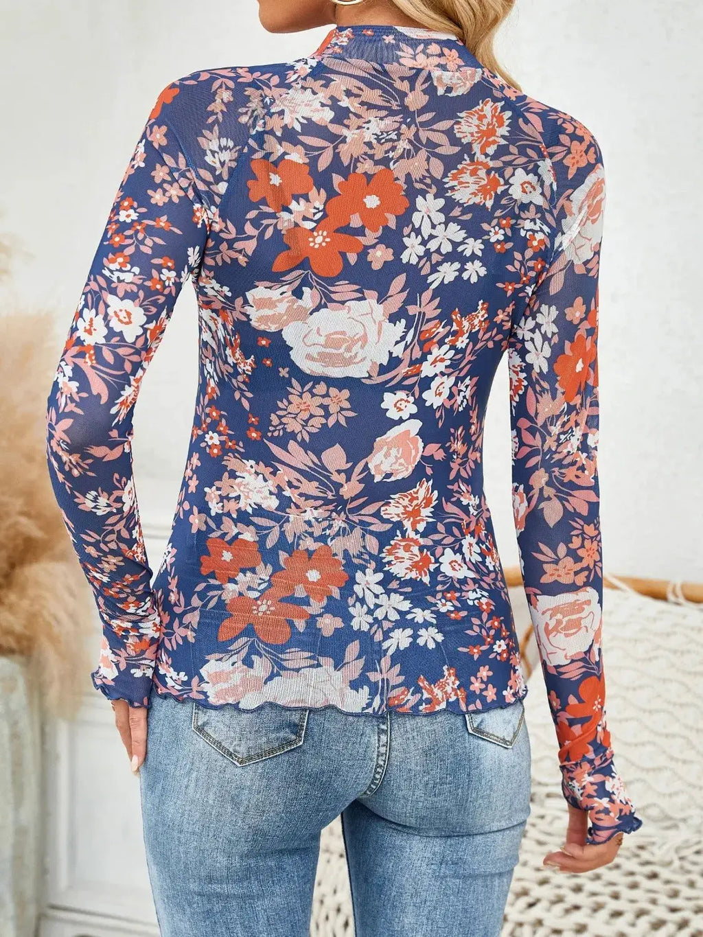 Floral mock neck long sleeve top, blue with red, white, and pink florals