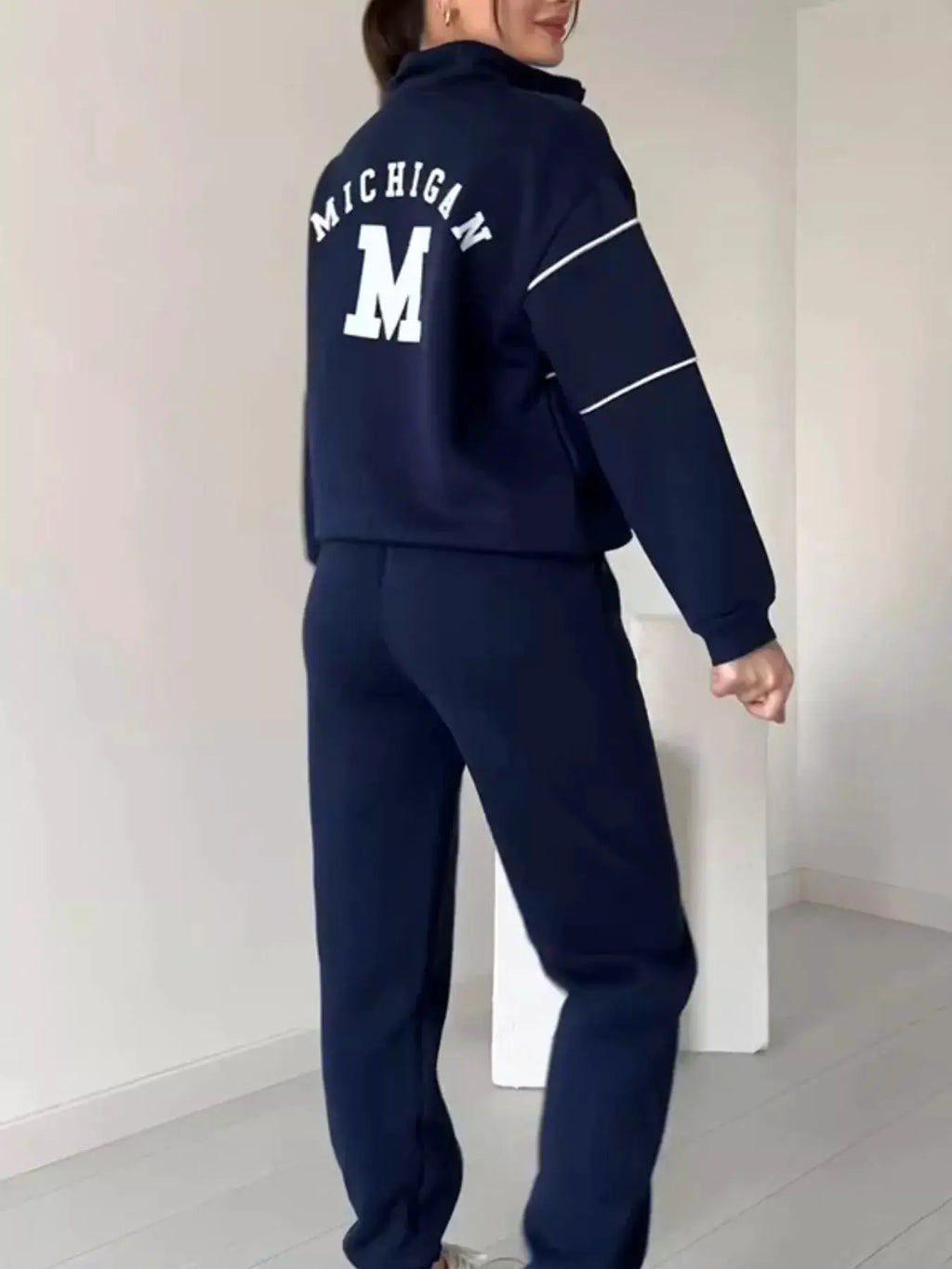 Full-size striped navy quarter-zip top and pants set, plus-size Belle Bijouix with Michigan logo on back