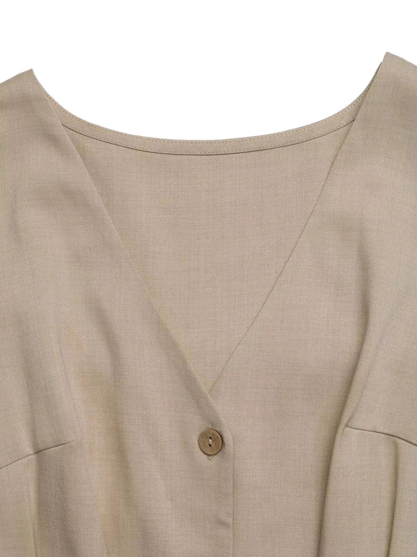 Sleeveless wrap-front button-down tie-waist romper in tan beige fabric by Trendsi