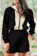 Two-Tone Zip-Up Romper in black and beige with front zipper and elastic waist