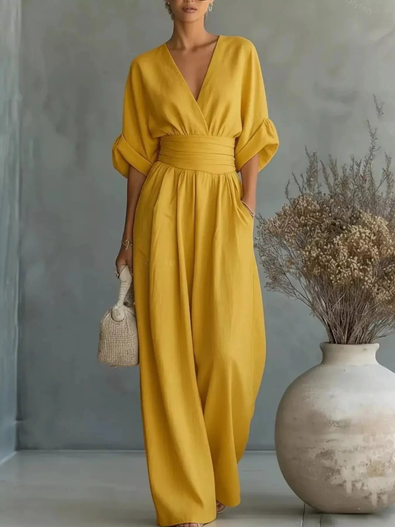 Jumpsuit, mustard yellow, plus-size V-neck wrap bodice with belted waist and wide-leg pants