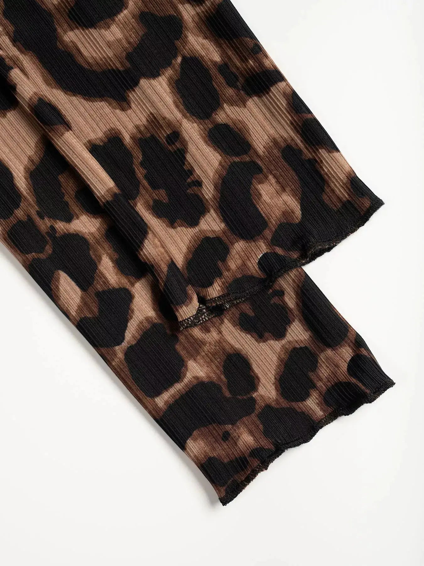 Leopard print Button-Down Top by Belle Bijouix; pleated fabric with lace detail