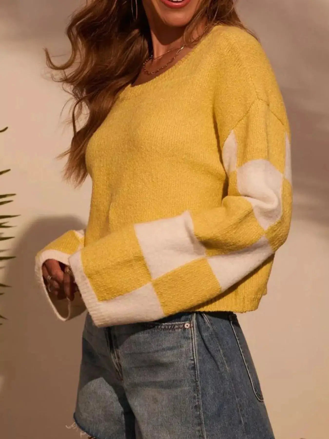 Color Block Long Sleeve Sweater in yellow with white color-block sleeves; knit texture.