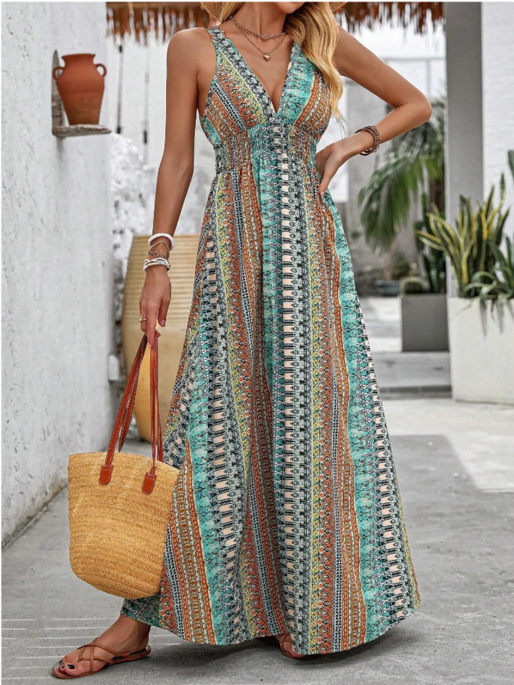 Tied Back Printed Sleeveless Maxi Slit Dress in teal/orange multicolor print, with straw tote