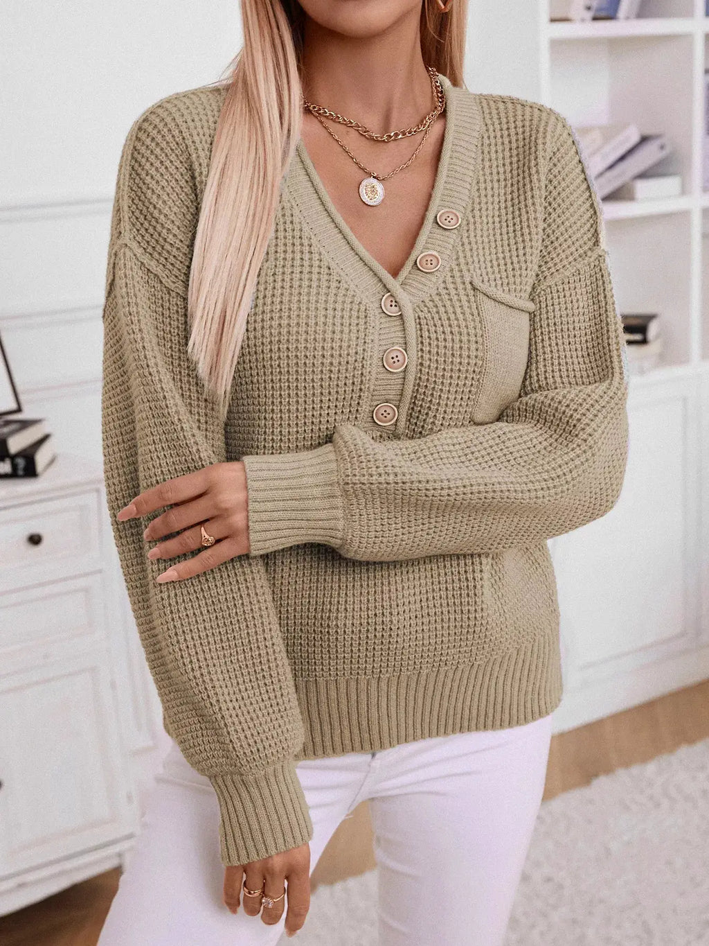 Button Detail Long Sleeve Sweater by Belle Bijouix, beige knit with front pocket and button placket.