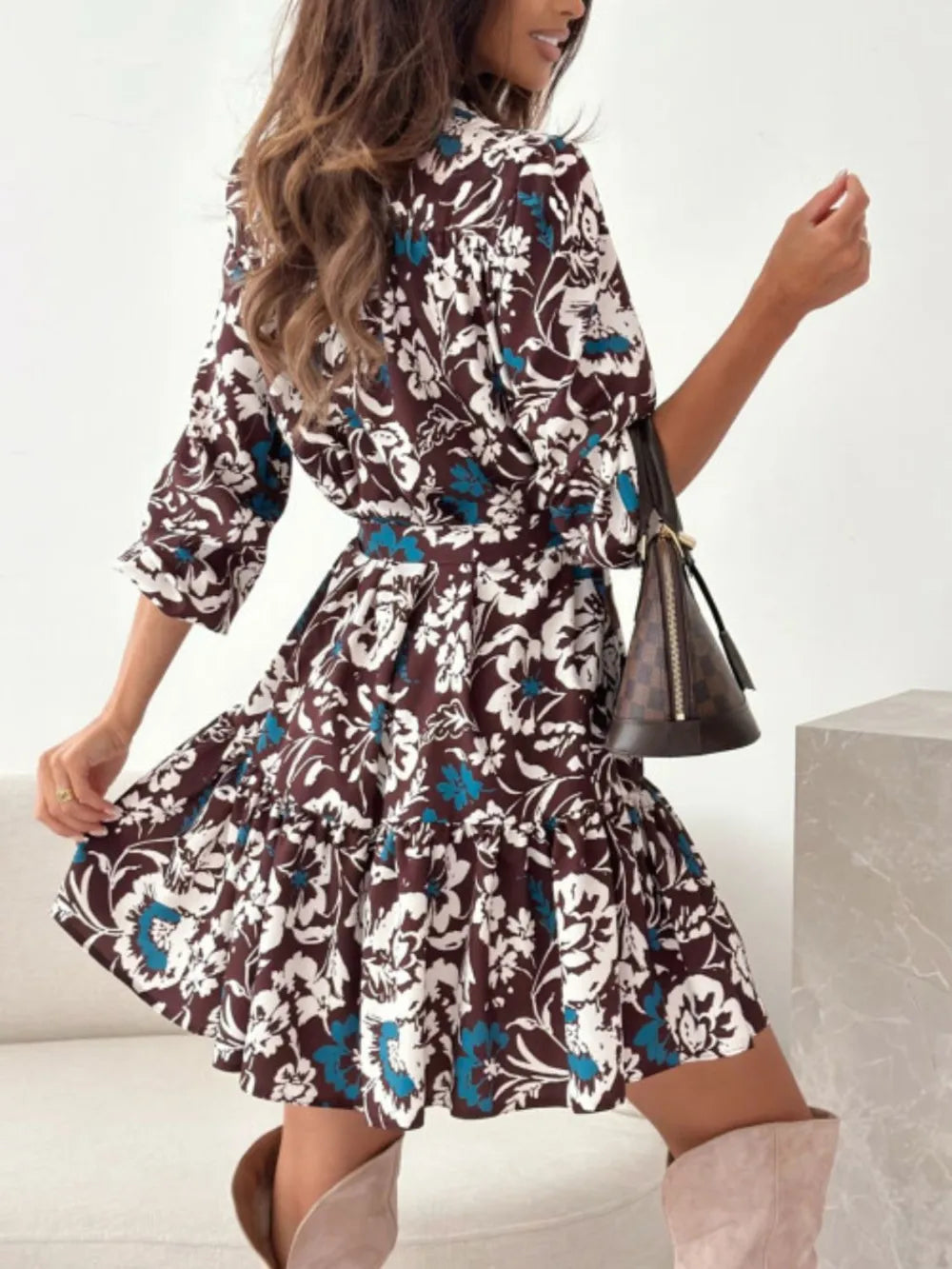 Ruffle Hem Floral Long Sleeve Dress Belle Bijouix in brown with white and teal flowers