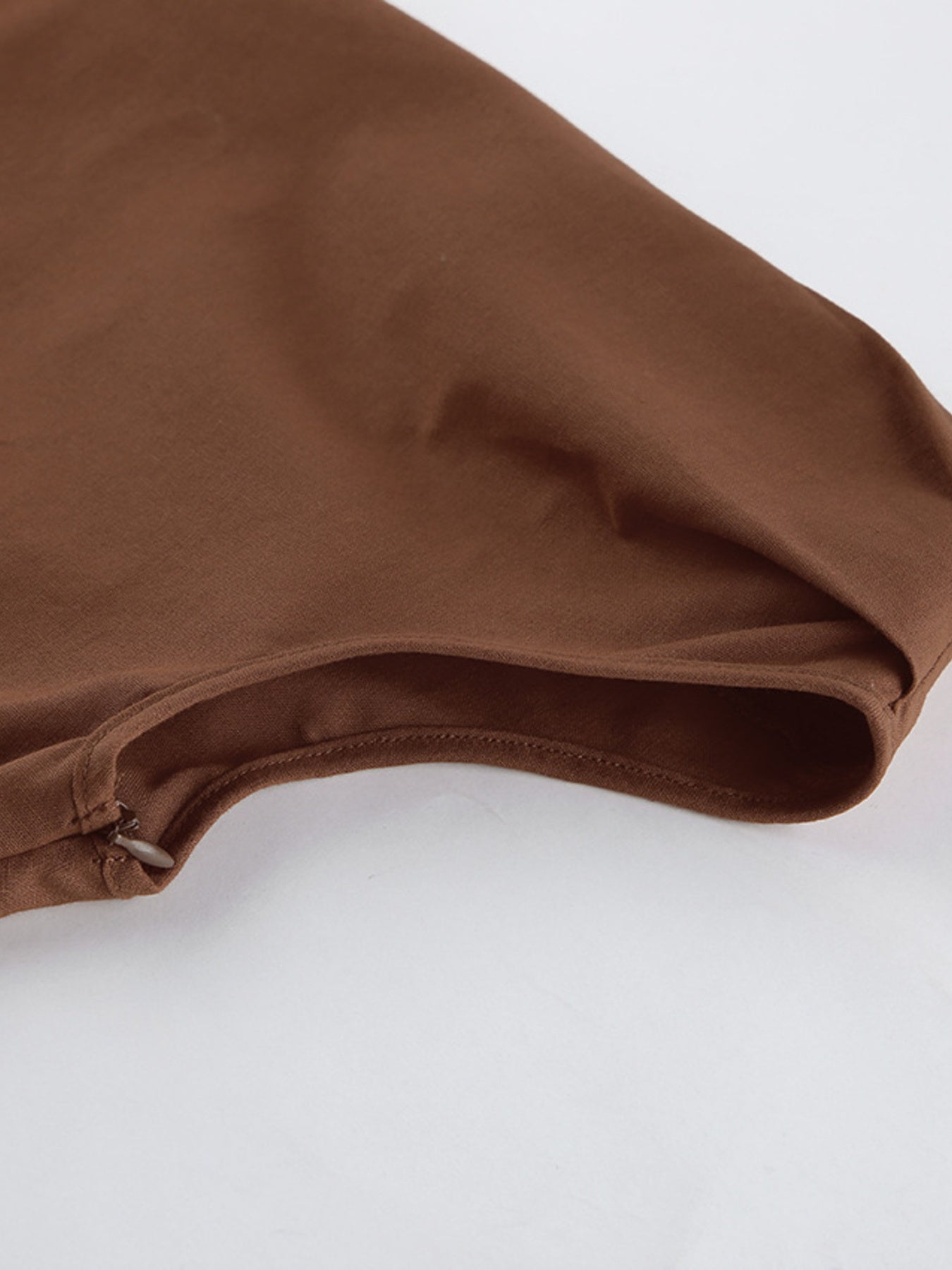 Belle Bijouix One-Shoulder Top and Shorts Set in brown fabric, ruched and asymmetrical.