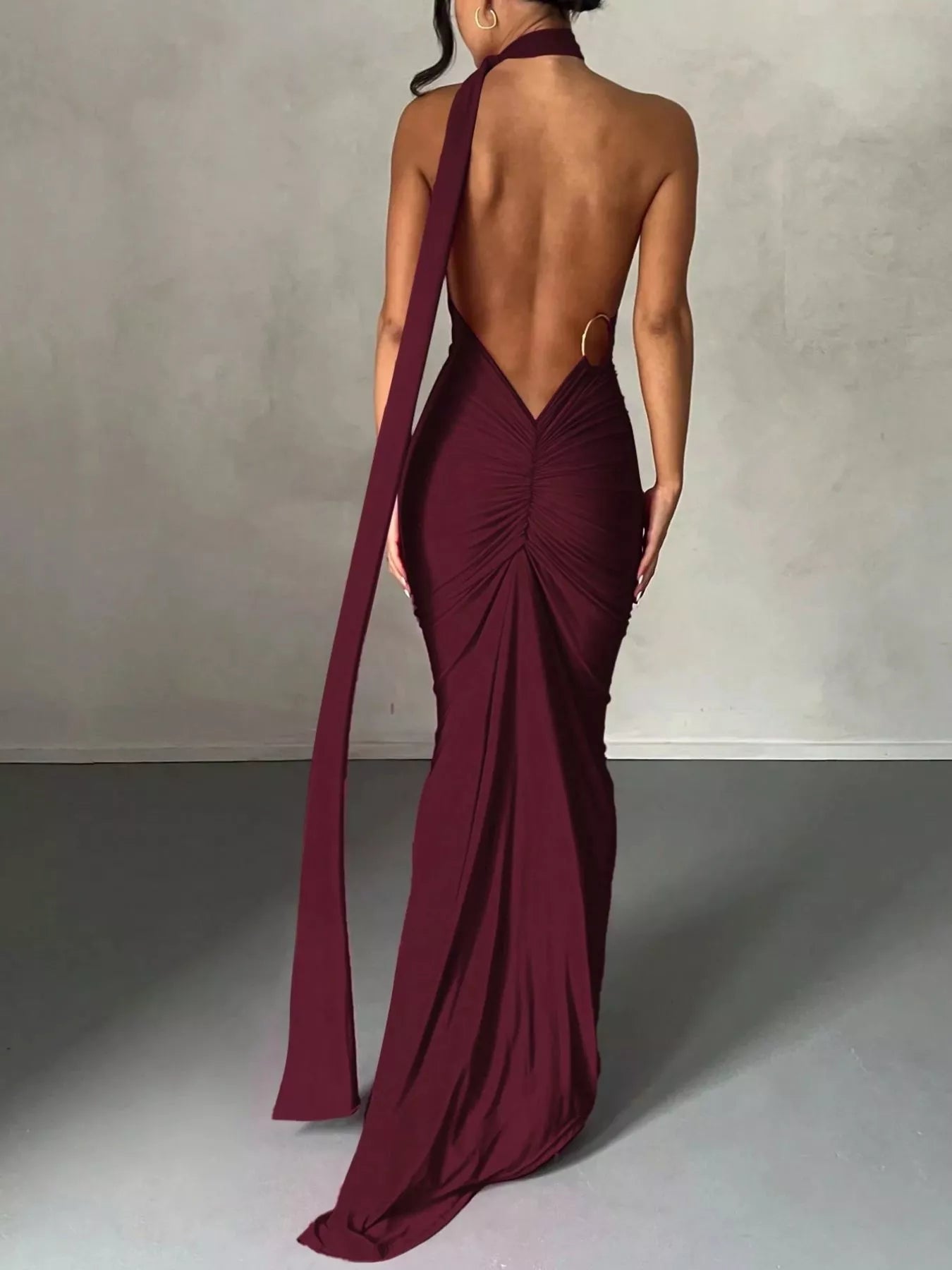 Backless One-Shoulder Ruched Bodycon Maxi Dress in burgundy with a long draped strap