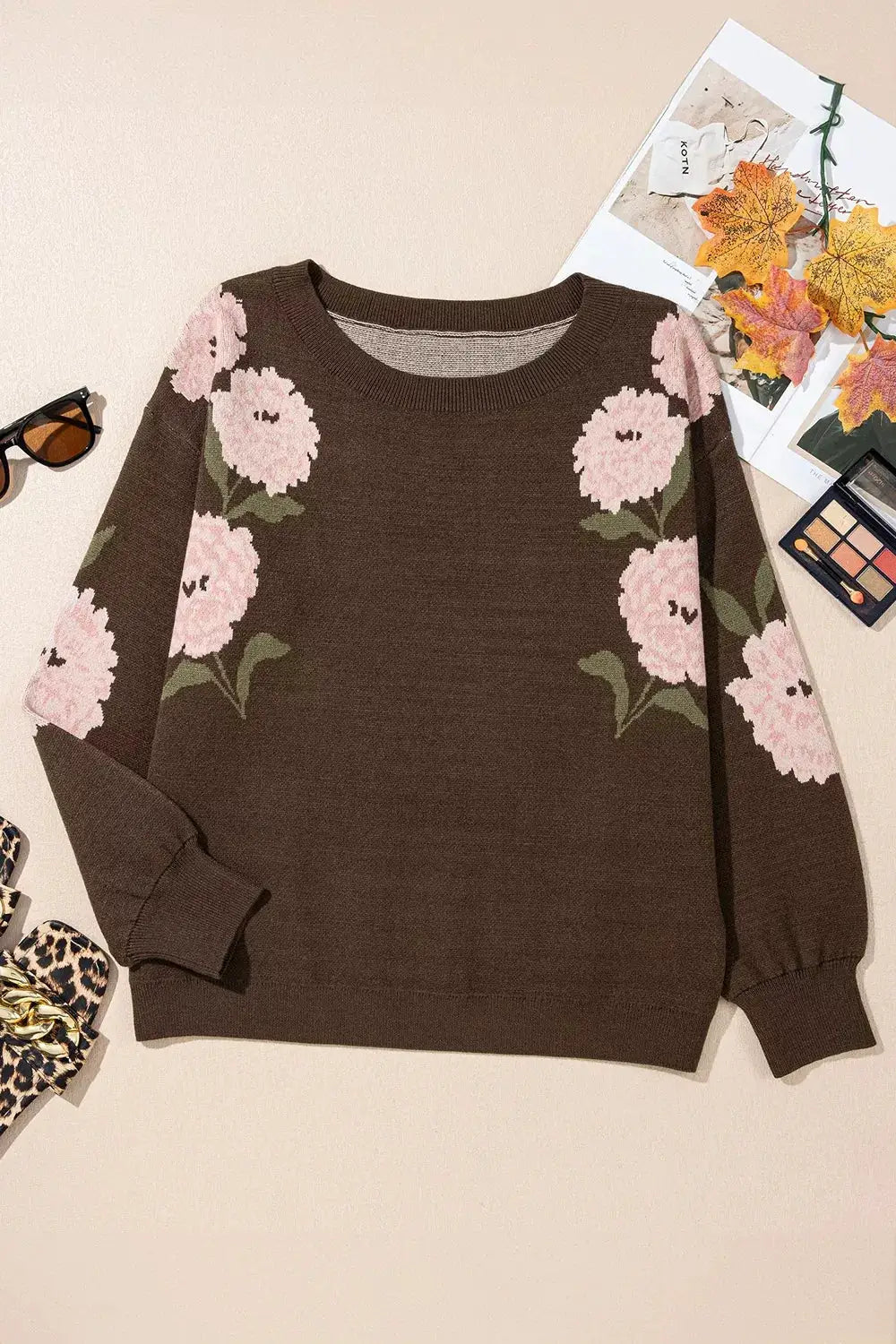 Floral print drop-shoulder knit sweater in brown with pink flowers, relaxed fit