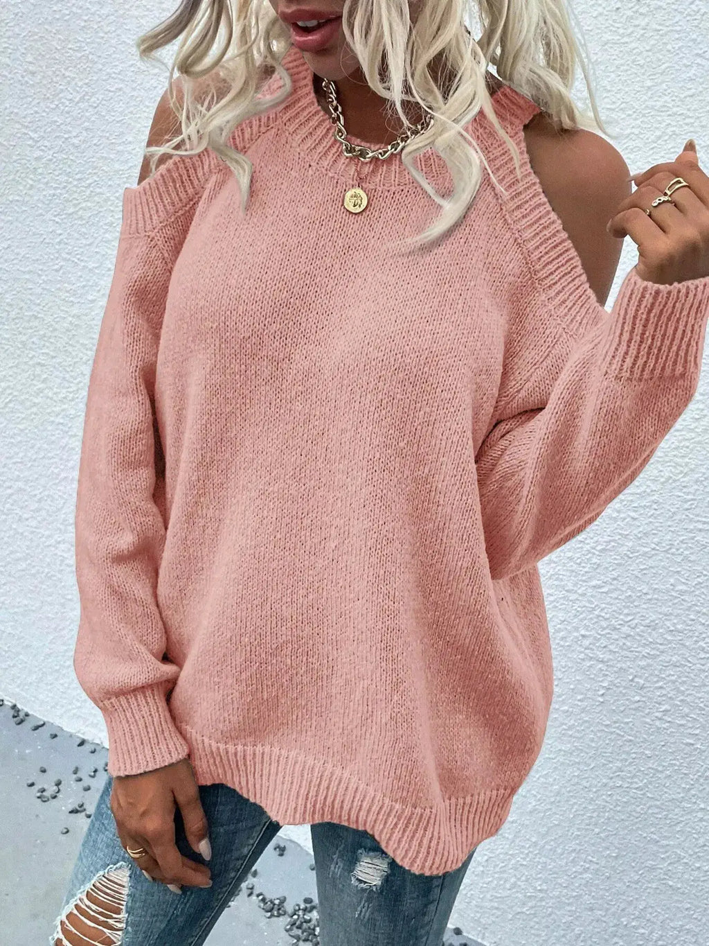 Cold-shoulder knit sweater in pink by Belle Bijouix with ribbed cuffs