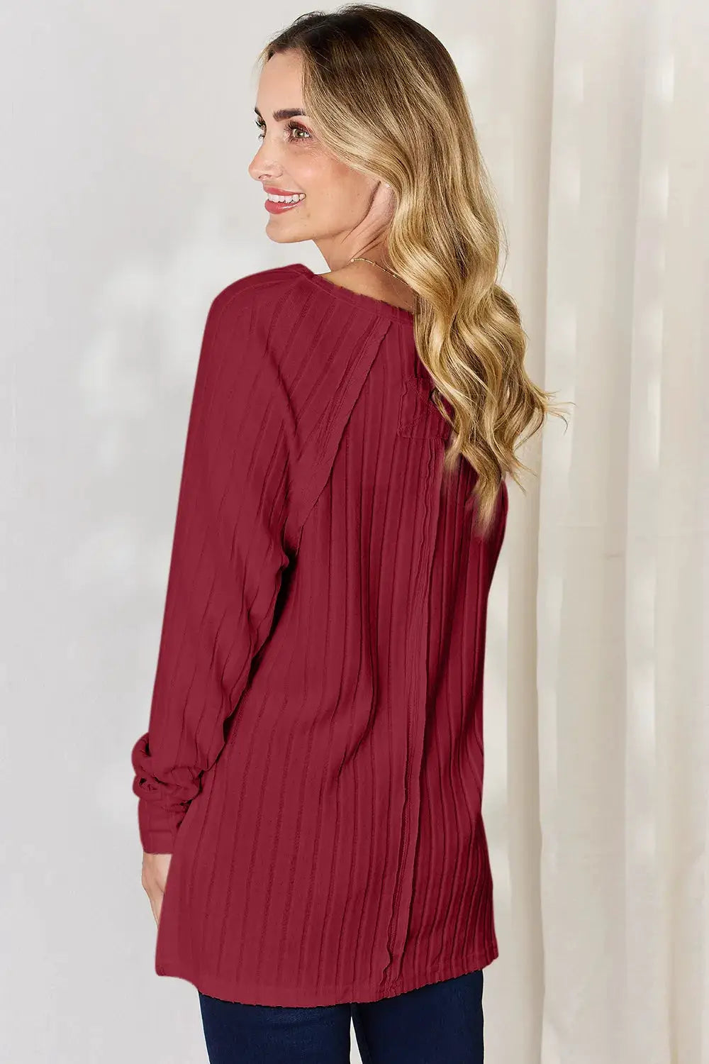 Belle Bijouix Basic Bae ribbed burgundy round-neck long-sleeve T-shirt shown from back on a model in studio lighting.