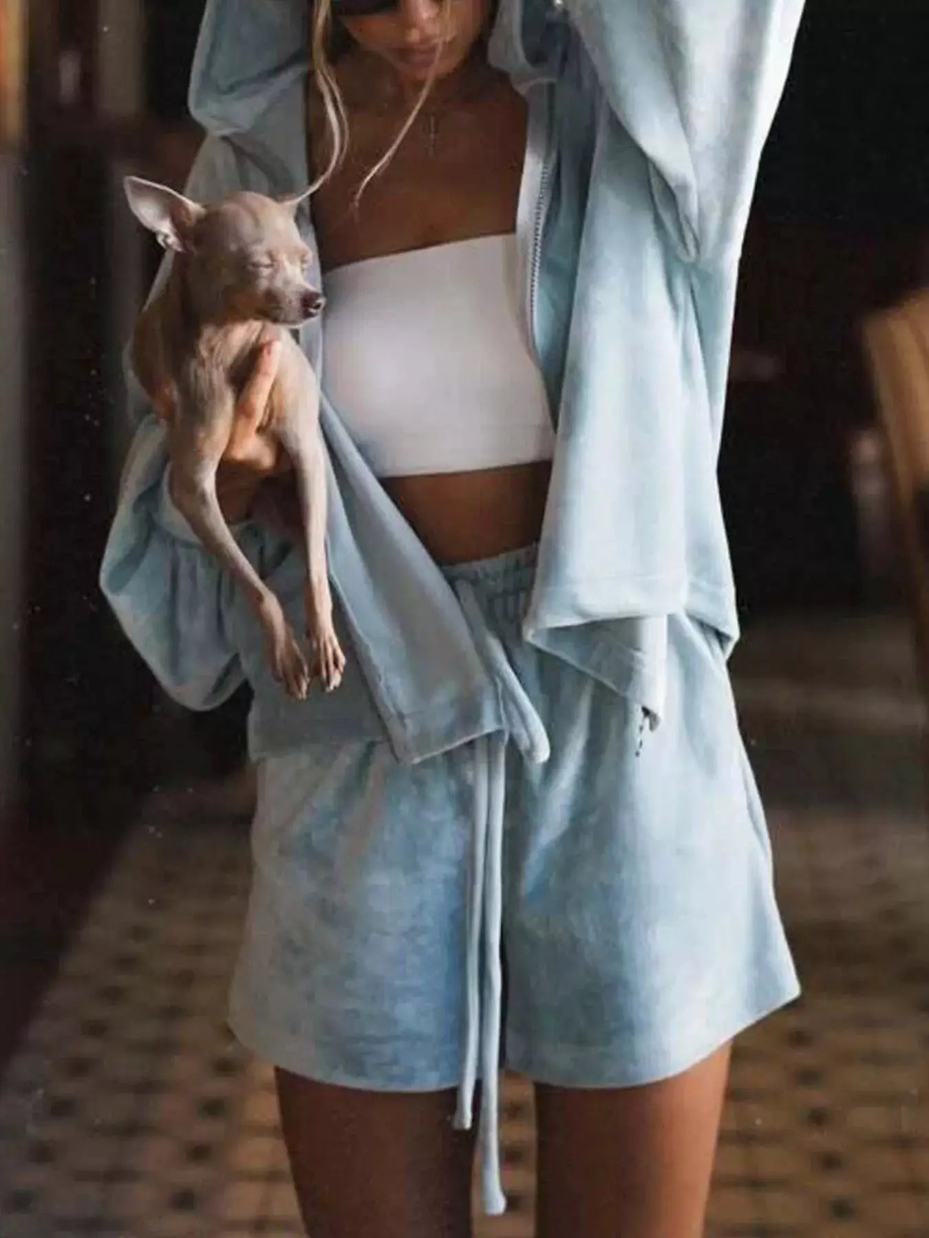 Zip-Up Hoodie & Shorts Activewear Set in light blue worn by a person holding a small dog